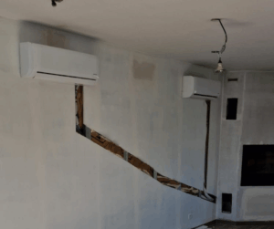 Travaux d'installation d'une climatisation réversible, avec saignée, sur Proville, Cambrai