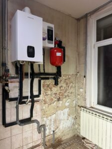 Installation d’une chaudière hybride Atlantic chez M. D et Mme P à Douchy-les-Mines